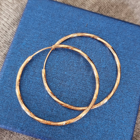 Large Twisted Gold Hoop Earrings